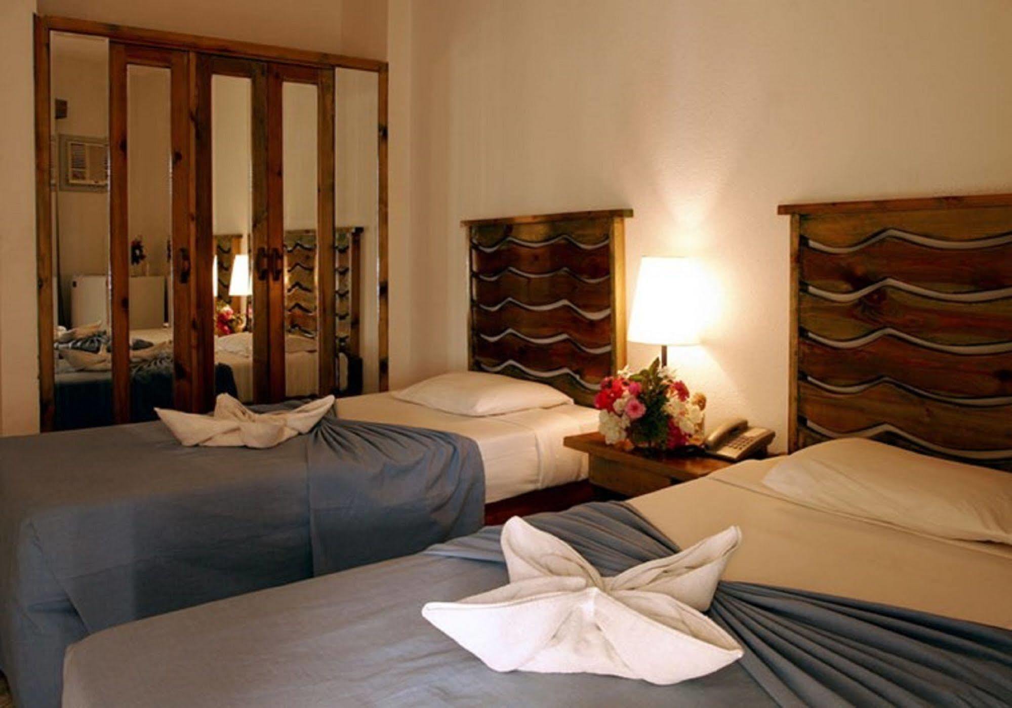 Empire Hotel Aqua Park Hurghada Quarto foto